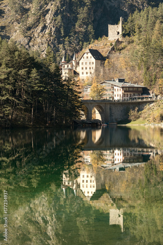 Reflection of ruin and castle in a mountain lake - Fernsteinsee  Tyrol