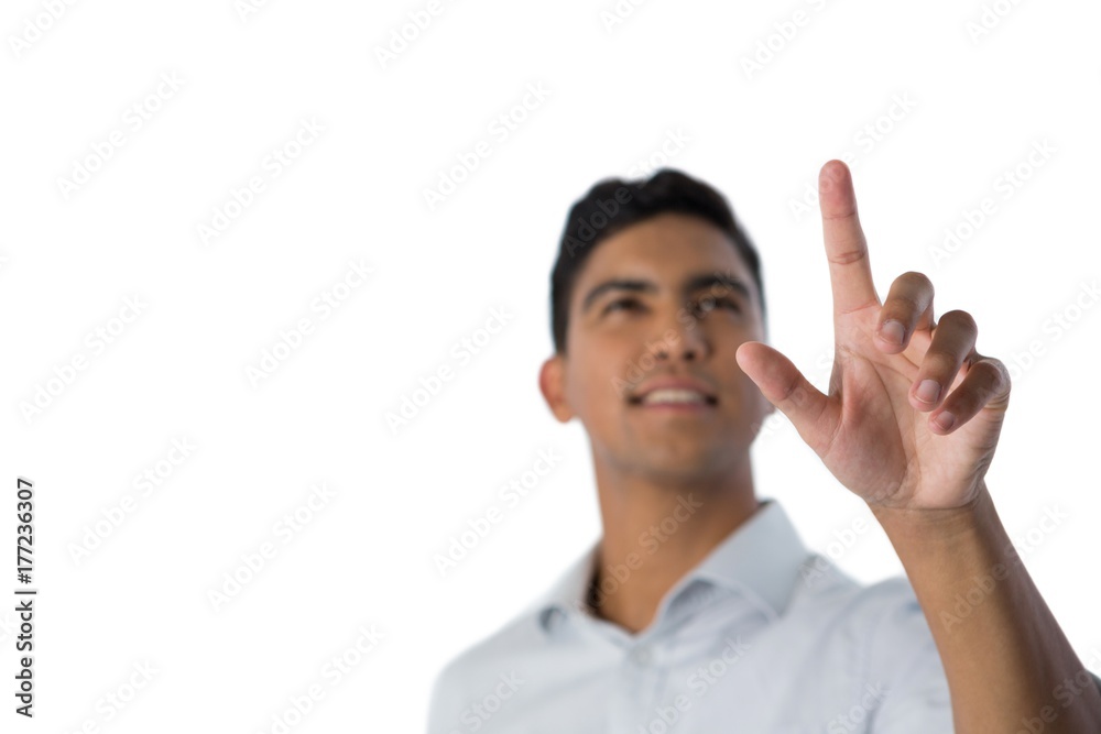 Man pretending to touch an invisible screen Man pretending to touch an invisible screen