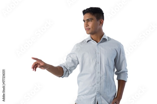 Man pretending to touch an invisible screen