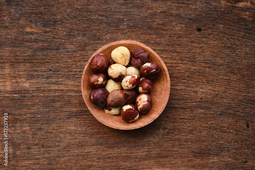 close up of hazelnut in wooden bowl 