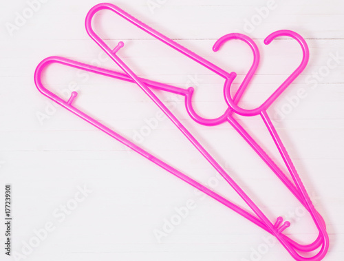 pink hanger on white background