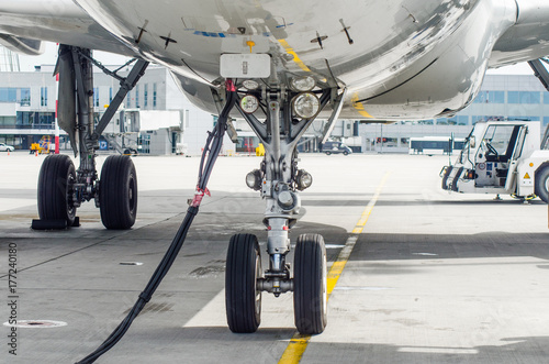 Front landing gear of the aircraft landing gear with power supply in the airport parking.