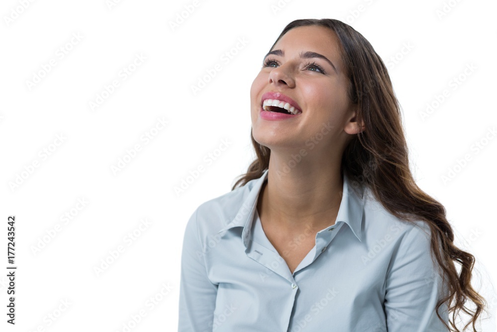 Female executive smiling against white background Female executive smiling against white background