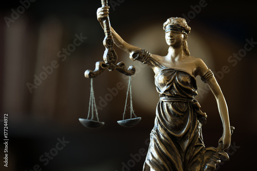 Law concept with Themis, symbol of justice.