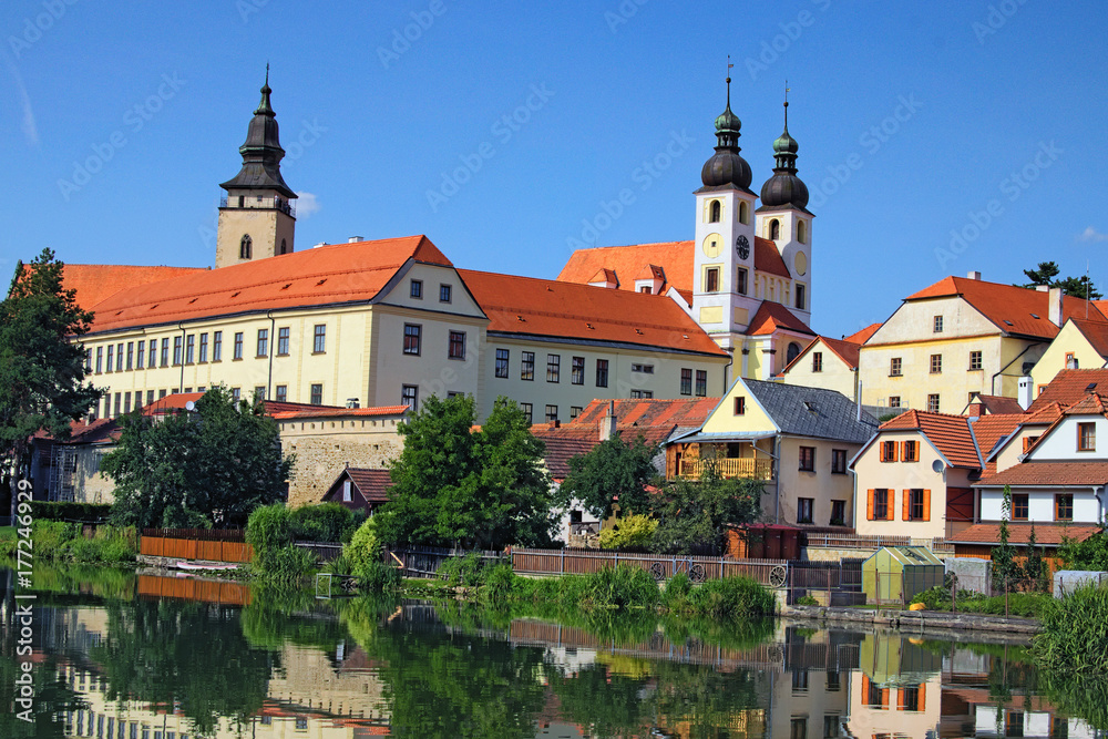 Telc is a town in southern Moravia in the Czech Republic. Telc Castle and city reflected in lake. A UNESCO World Heritage Site