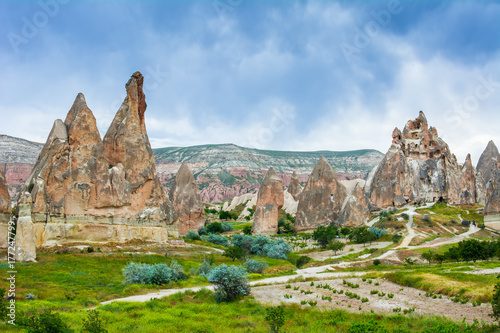 Wonderful landscape with ancient church at Cappadocia, Anatolia, Turkey. Volcanic mountains in Goreme national park.