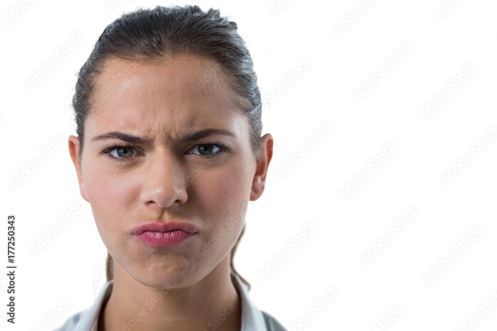 Confused female executive against white background Confused female executive against white background