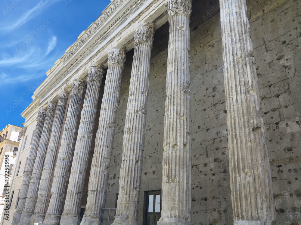 Naklejka premium Classical old and worn out columns at the front of the pantheon in Rome