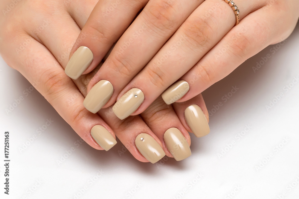 Delicate beige manicure with crimson Delicate beige manicure with crimson