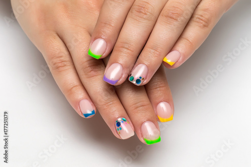 Multicolored yellow, blue, green and purple french manicure with sparkles candy on square long nails