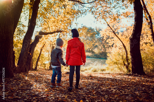 little boy and girl are walking in the autumn park. © Ivanna Pavliuk