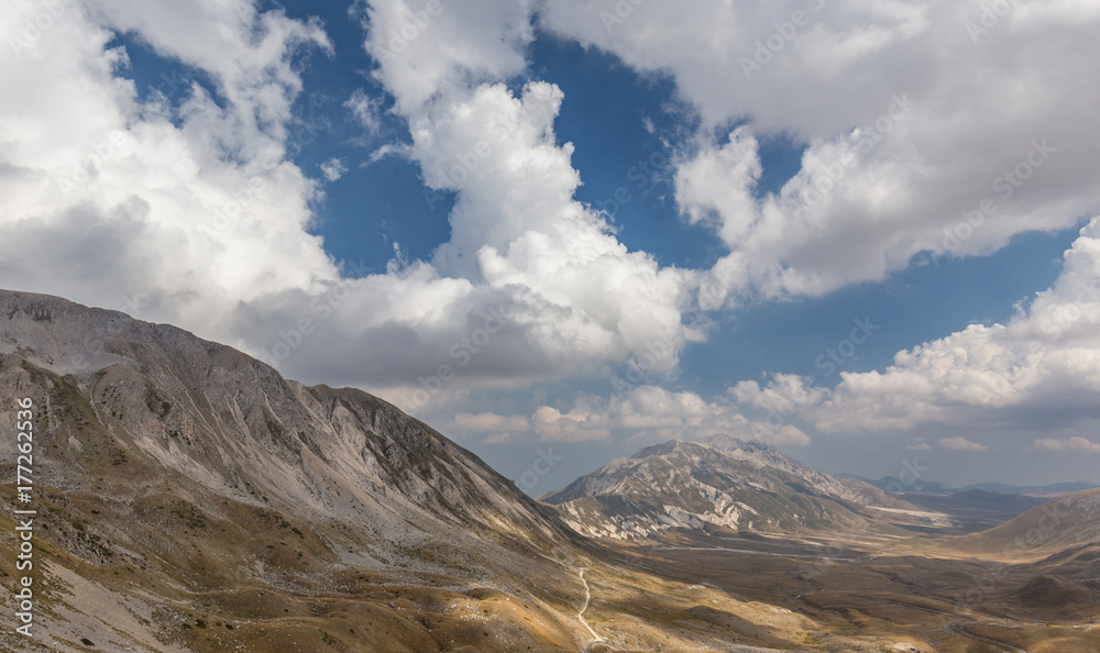 Blue sky with clouds over Campo Imperatore at Gran Sasso National Park, Italy