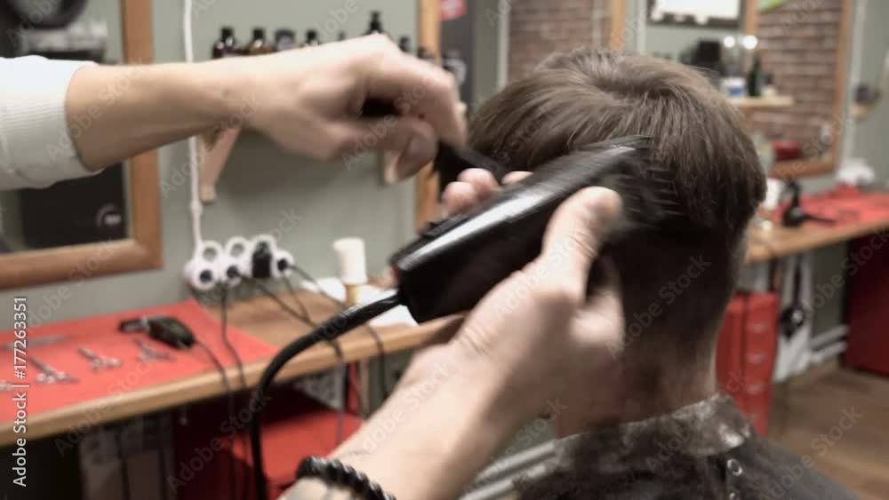 Hairdresser in the process of working with a new client close-up 4k. Hairdresser in the process of working with a new client close-up 4k.