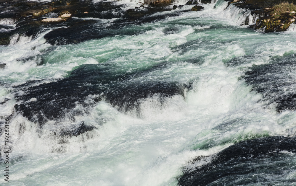 Water of the Rhine river just above the Rhine Falls Water of the Rhine river just above the Rhine Falls
