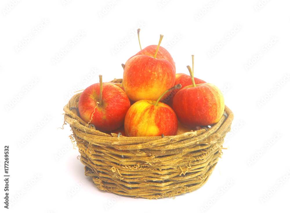 Fresh Little Apples in basket on wihte background Fresh Little Apples in basket on wihte background
