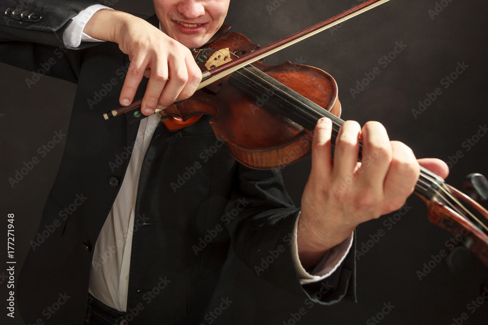Man man dressed elegantly playing violin Man man dressed elegantly playing violin