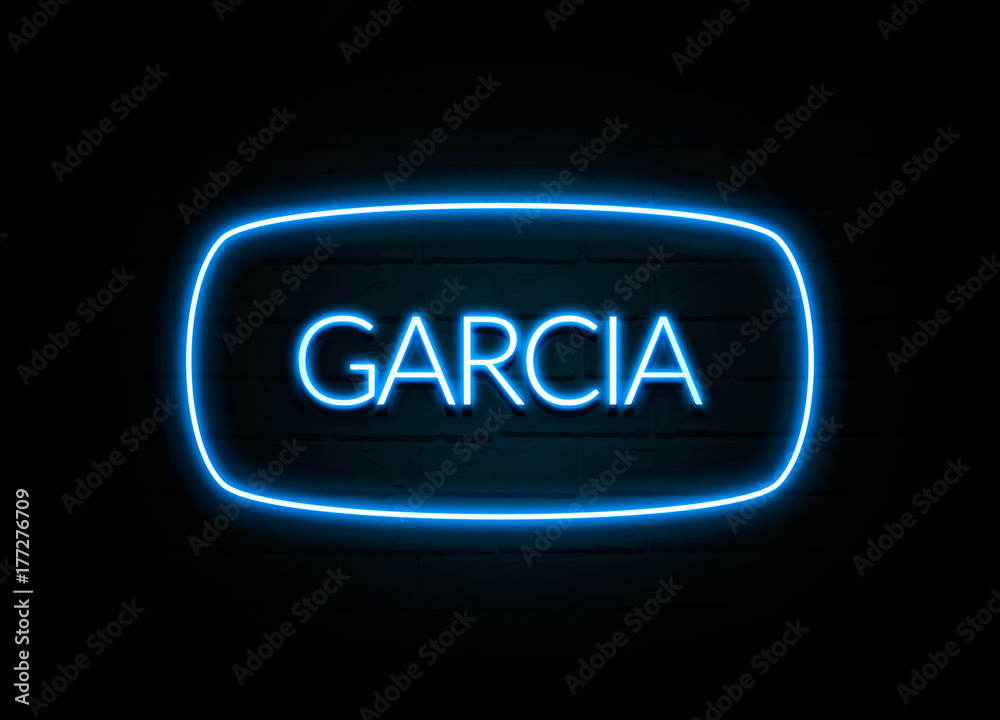 Garcia - colorful Neon Sign on brickwall Garcia - colorful Neon Sign on brickwall