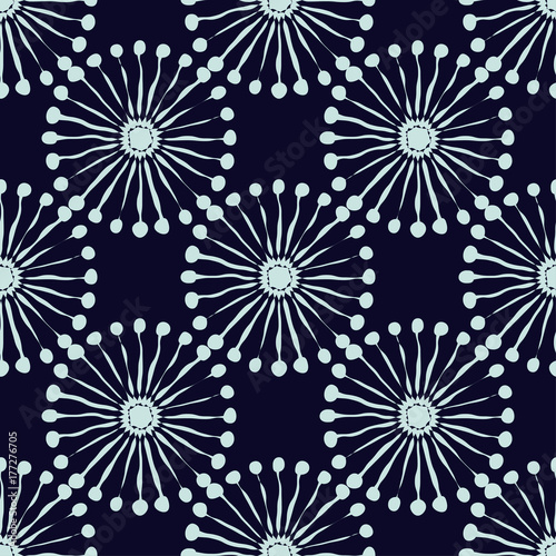 Seamless background with decorative snowflakes. Winter pattern. Textile rapport.