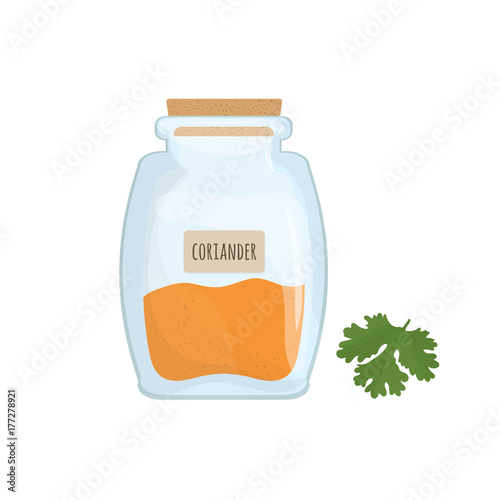 Coriander seeds stored in glass jar isolated on white background