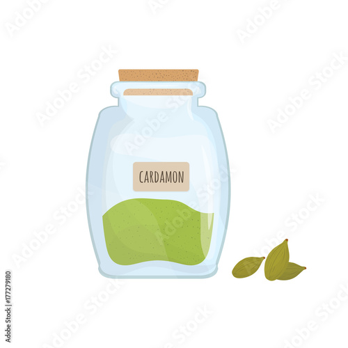 Cardamon seeds stored in glass jar isolated on white background. Aromatic her...