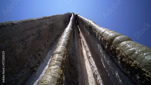 bottom point panoram big calcium stalagmite with water, Mexico Hierve el Agua