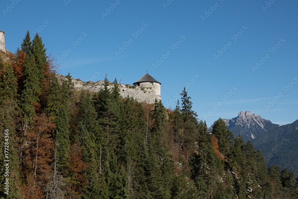A tower above the trees of Ehrenberg Castle in Austria next to Highline  179