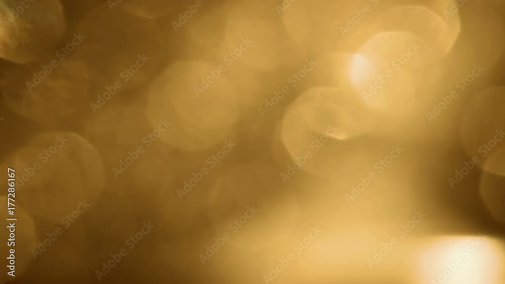 Gold Super Soft Bokeh. Warm shifting light elements against a precious metal background. Ideal for either compositing over shots or using as a luxurious high end background for text. A magical effect. Gold Super Soft Bokeh. Warm shifting light elements against a precious metal background. Ideal for either compositing over shots or using as a luxurious high end background for text. A magical effect.