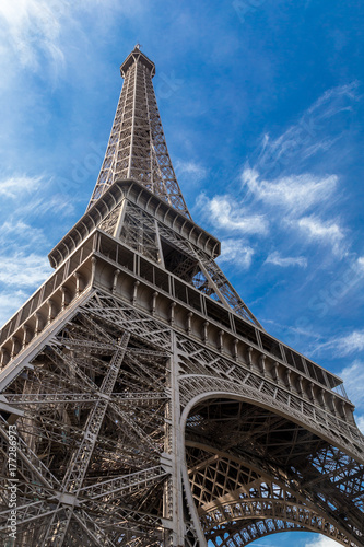 Eiffel Tower in Paris, France on a blue sky