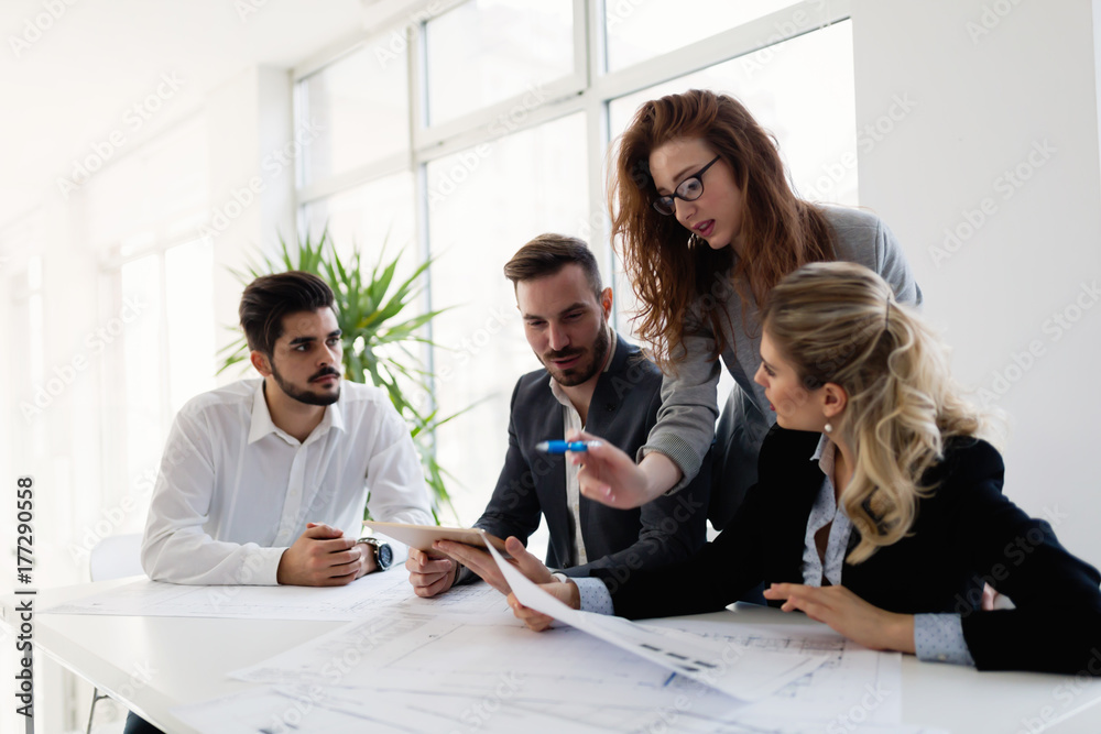 Fototapeta premium Group of architects working together on project