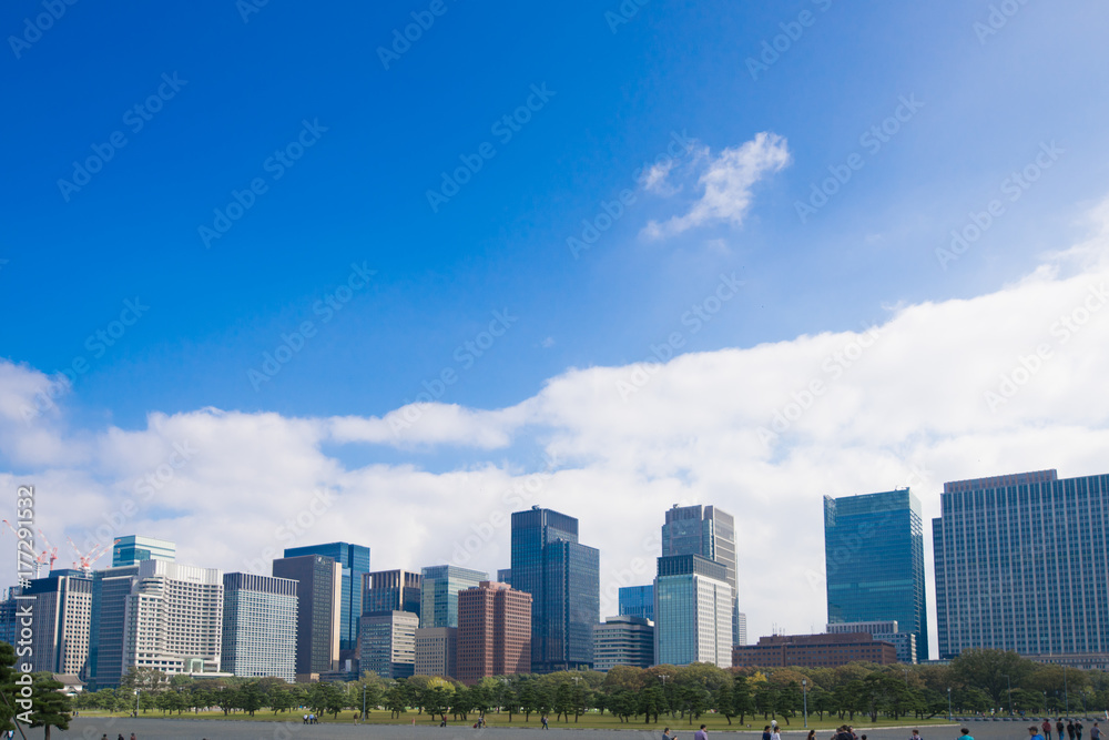 Skyscrapers in the city with blue sky of Tokyo, Japan. Skyscrapers in the city with blue sky of Tokyo, Japan.