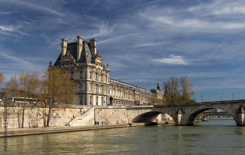 View of the Louvre Museum and Pont des arts, Paris - France