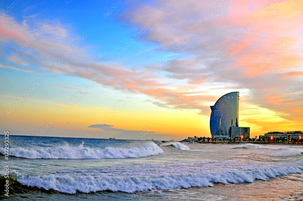 Barcelona beach on sunset - obrazy, fototapety, plakaty 