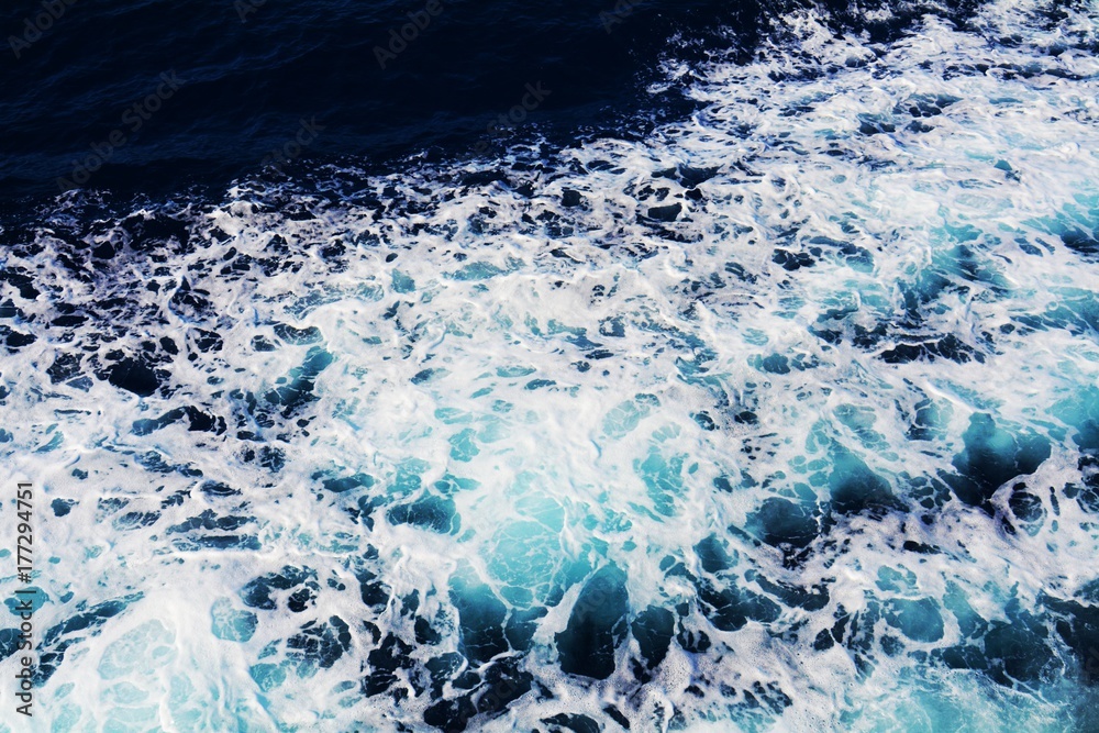 Fototapeta premium Waves and bubbles background, sea texture
