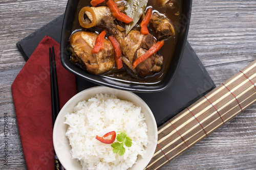 Chicken thighs in sauce Adobo. National filipino dish. photo