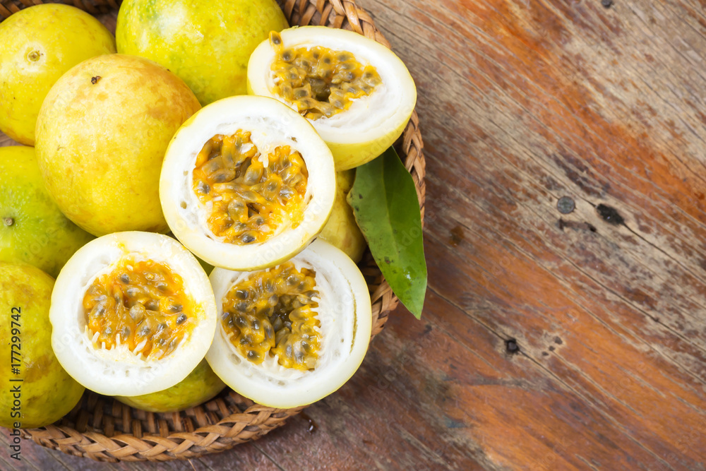 Passion fruit in bamboo basket. Tropical fruit. Sour taste, higth vitamin. Diet dessert. Passion fruit in bamboo basket. Tropical fruit. Sour taste, higth vitamin. Diet dessert.