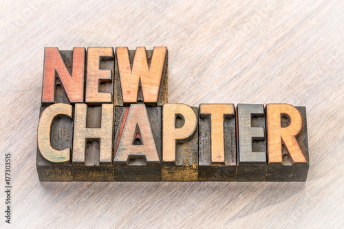 new chapter word abstract in wood type photo
