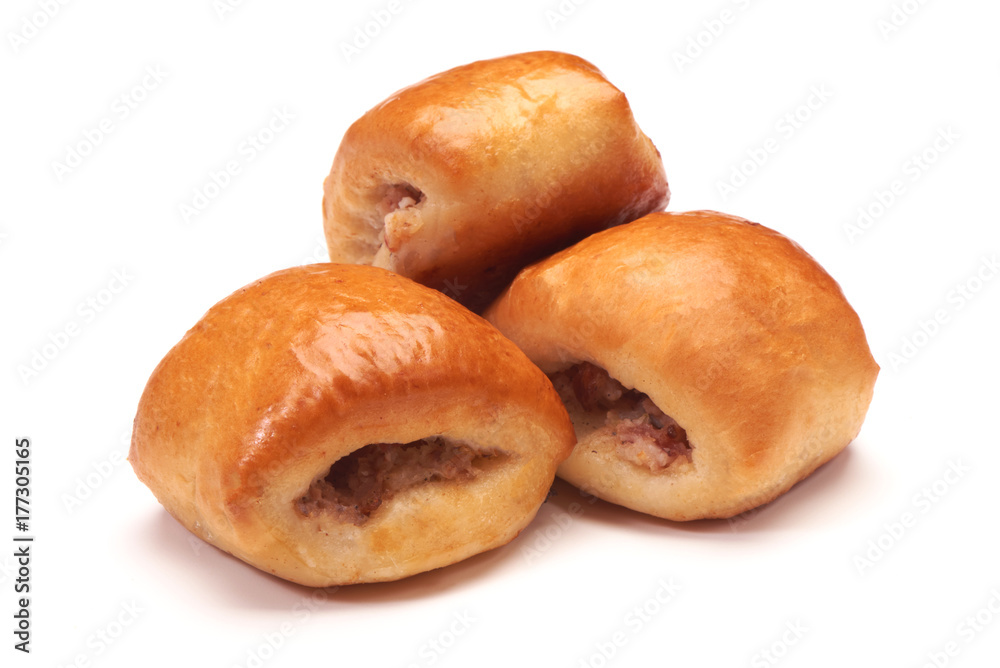 Meat pies. Homemade cooking. Bun made of wheat flour with meat, isolated on white background Meat pies. Homemade cooking. Bun made of wheat flour with meat, isolated on white background