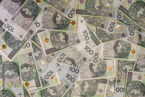 Polish currency banknotes as a background 100 zl
