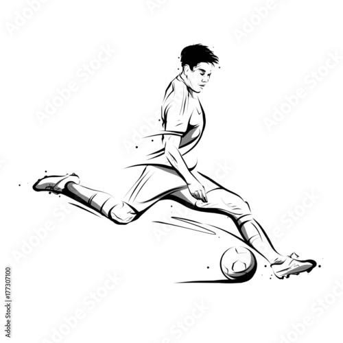 Soccer player kicking the ball