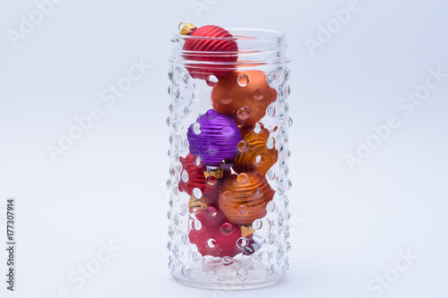 Unique jar of colorful ornaments for holiday