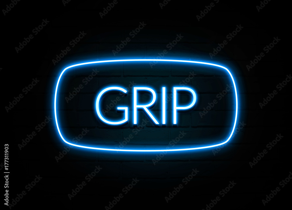 Grip - colorful Neon Sign on brickwall Grip - colorful Neon Sign on brickwall