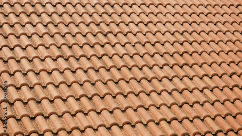 orange clay tiles on the roofs of houses orange clay tiles on the roofs of houses