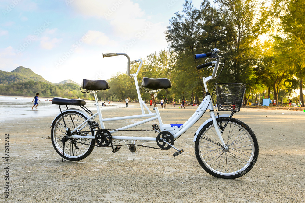Fototapeta premium Tandem Bicycle parking on the beach