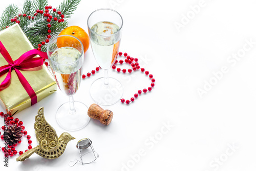 Party with present box, spruce, champagne and glasses to celebrate New Year 2018 on white background mock-up