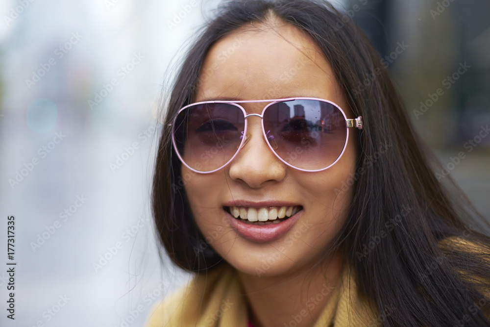 young asian woman smile at camera young asian woman smile at camera