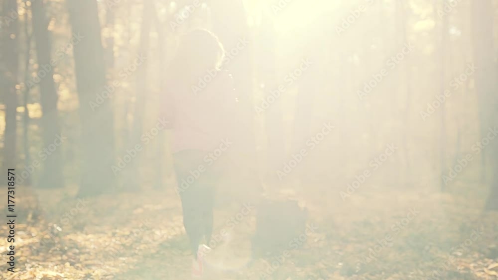 Woman Running and Speek on Headphones