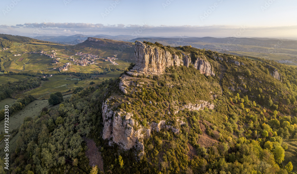 Aerial view of Solutre rock in Burgundy at sunrise, France
