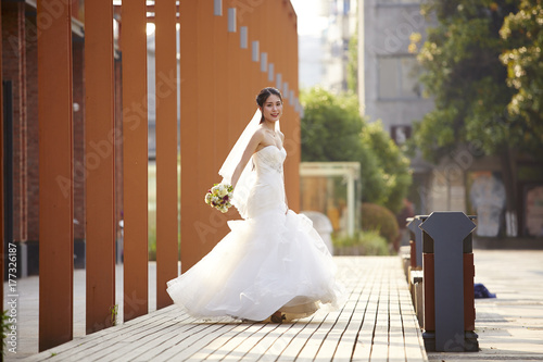 outdoor portrait of asian bride
