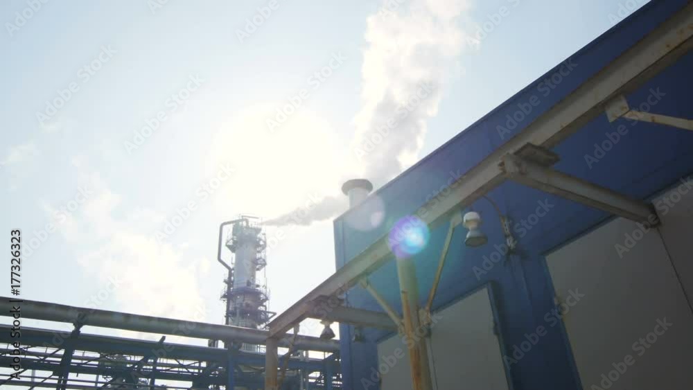 Camera Shows Industrial Landscape Tower in White Smoke Camera Shows Industrial Landscape Tower in White Smoke