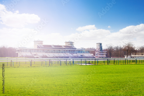 Chantilly racecourse with stands at sunny day photo